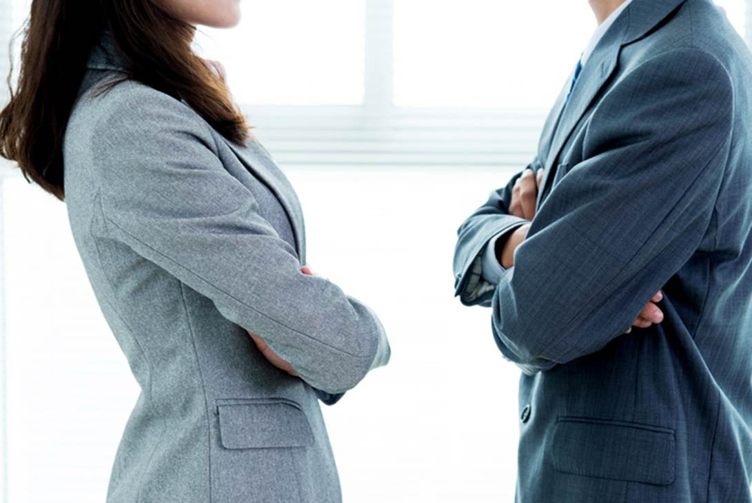 A person and person standing with their arms crossed

AI-generated content may be incorrect.